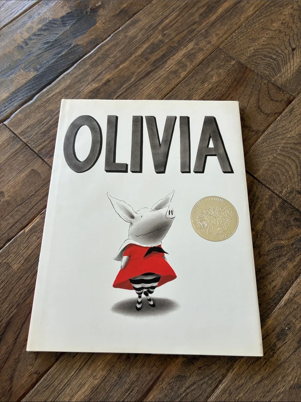 Olivia Hardcover Picture Book — Red Dress Illustration
